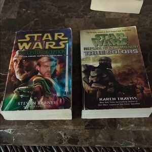 Star Wars paperback books with multicolor and brown covers